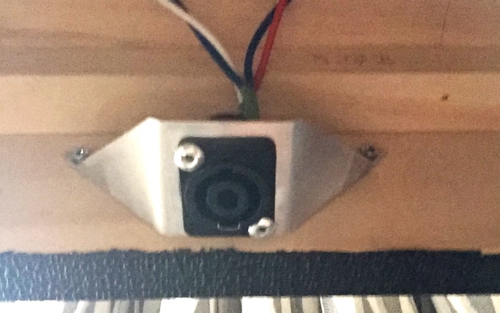 Amp to speaker socket and bracket viewed from the inside